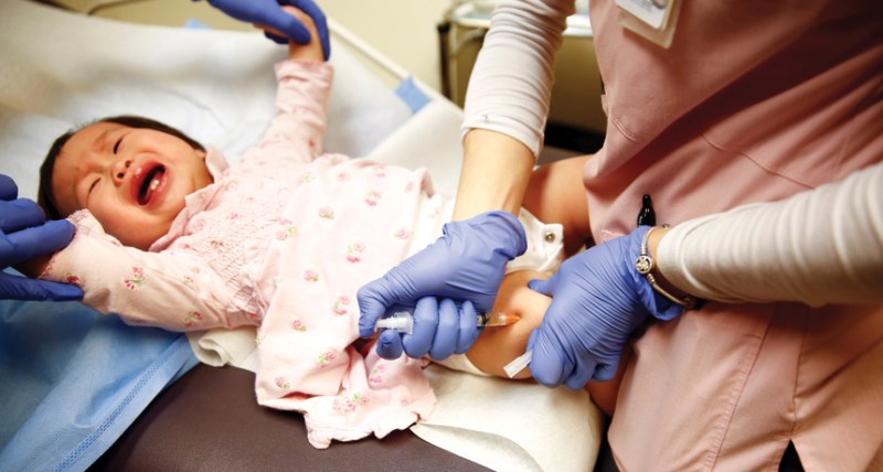 1 year old girl getting MMR vaccine