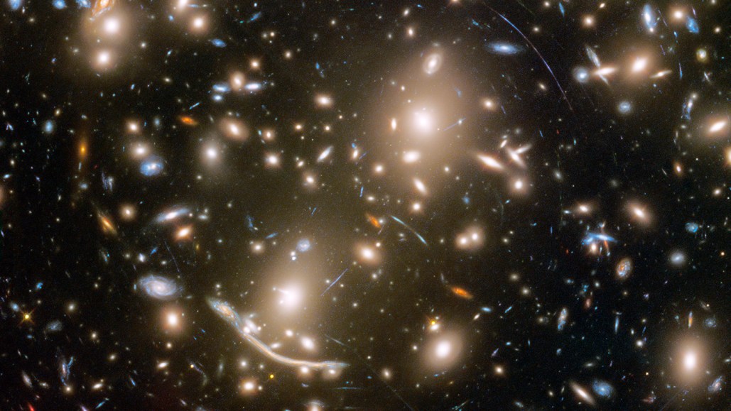 Streaks around the galaxy cluster Abell 370 reveal more distant galaxies whose light has been bent and distorted by an effect called gravitational lensing.