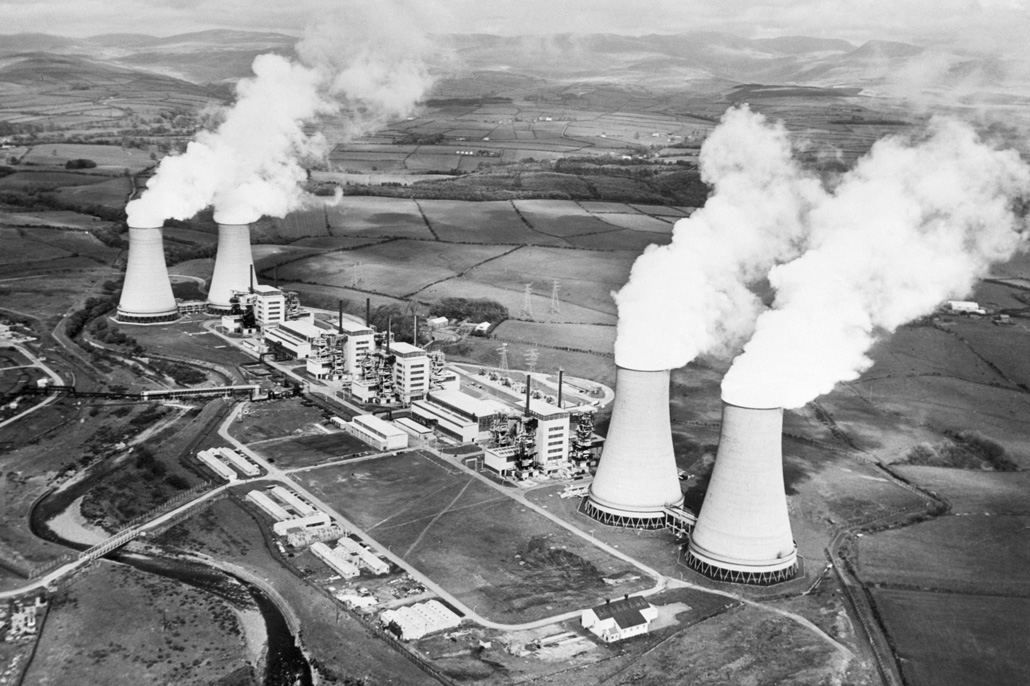 aerial black and white photo of a nuclear power plant