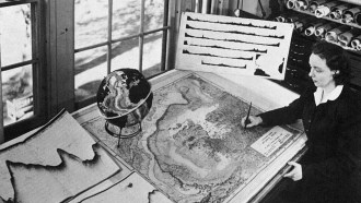 photo of Marie Tharp and her map