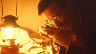 Harry Whittington looking at fossils