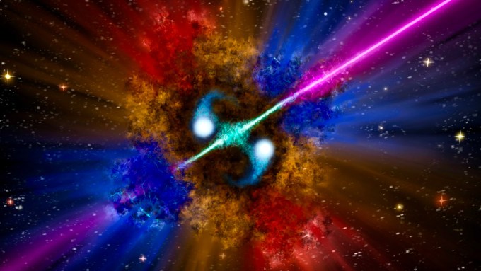 An illustration of a pair of compact stars merging (bright dots in the center) and emitting jets of radiation (green and purple beams)