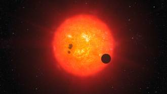 An illustration of exoplanet GJ 1214b and its star.